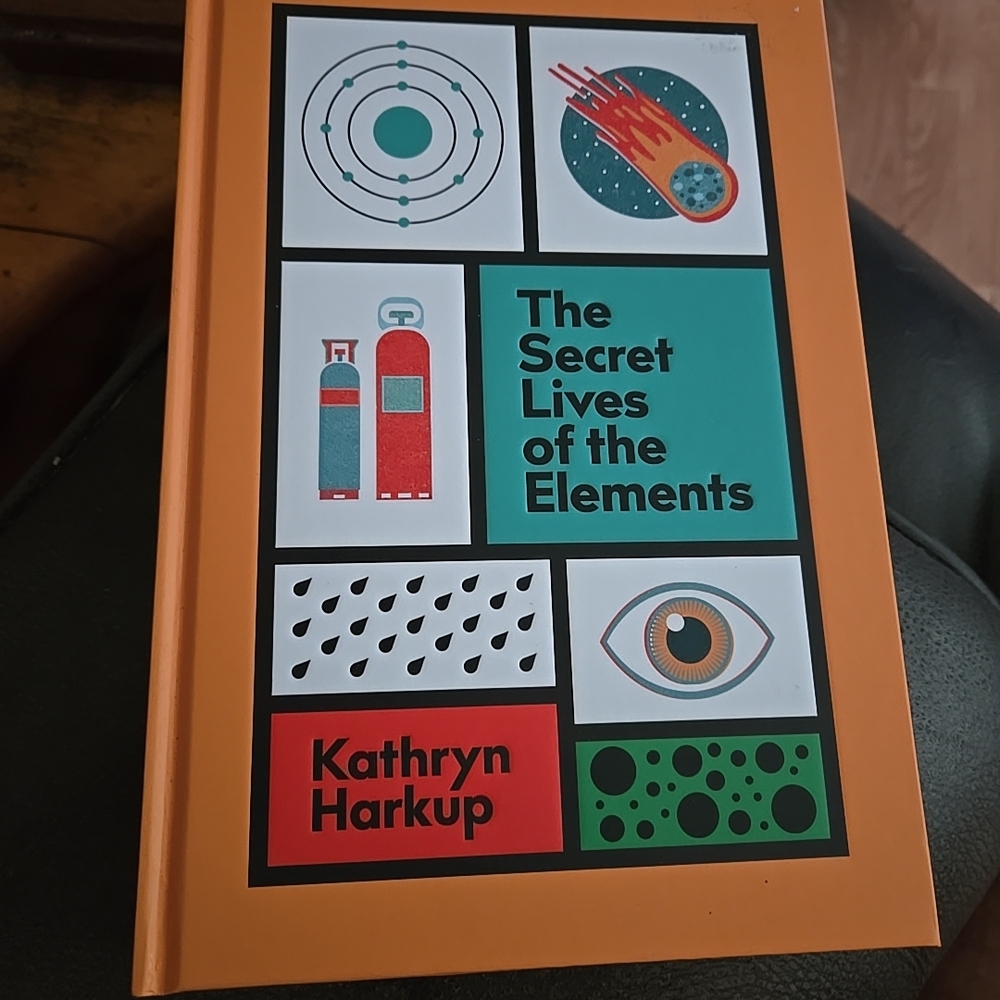 Orange Hardcover Book by Kathryn Harkup